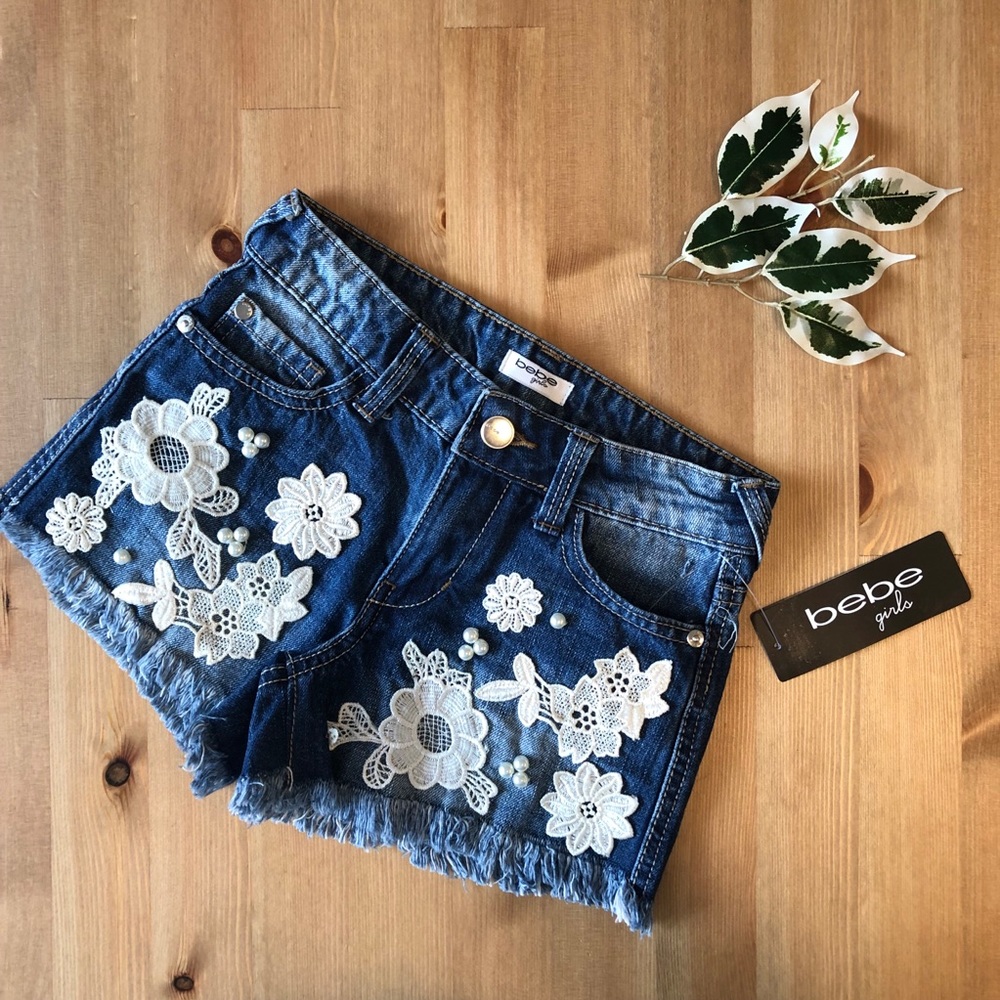 Bebe girls NWT jean shorts with white lace detail